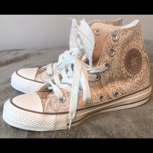 White high top converse with gold glitter pattern